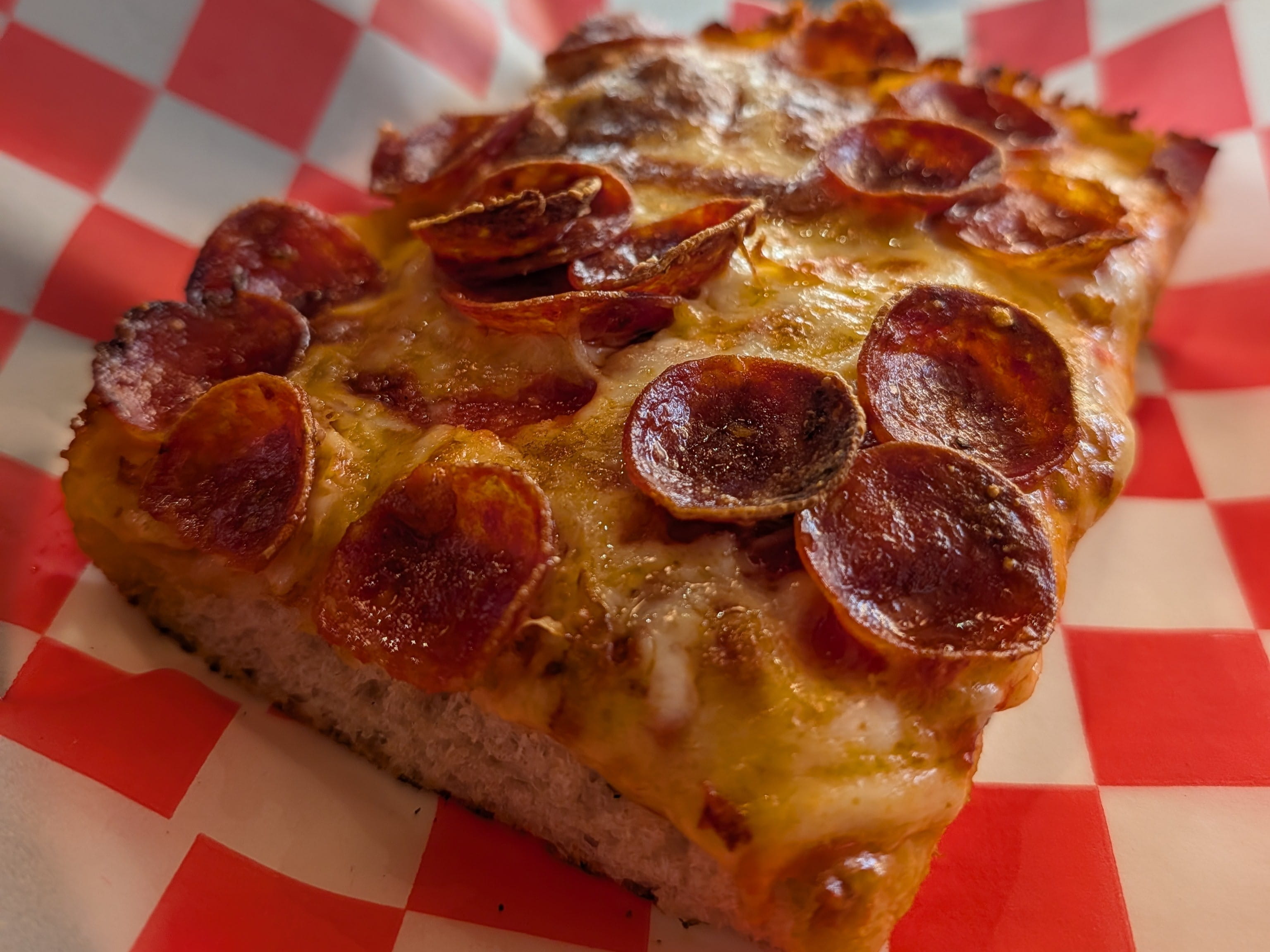 Sicilian pepperoni pizza slice from Upside Pizza