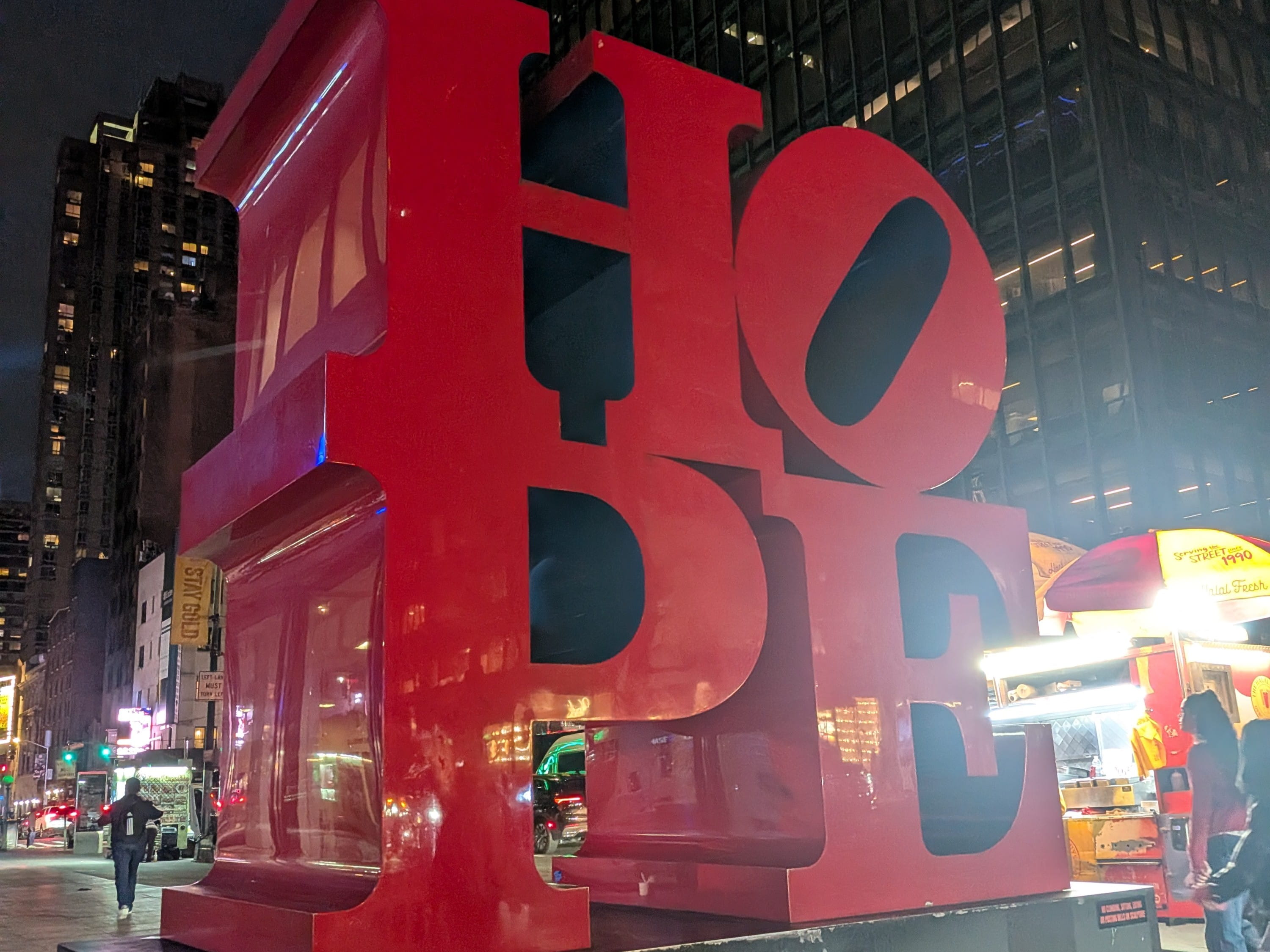 HOPE sculpture lit up at night in New York City