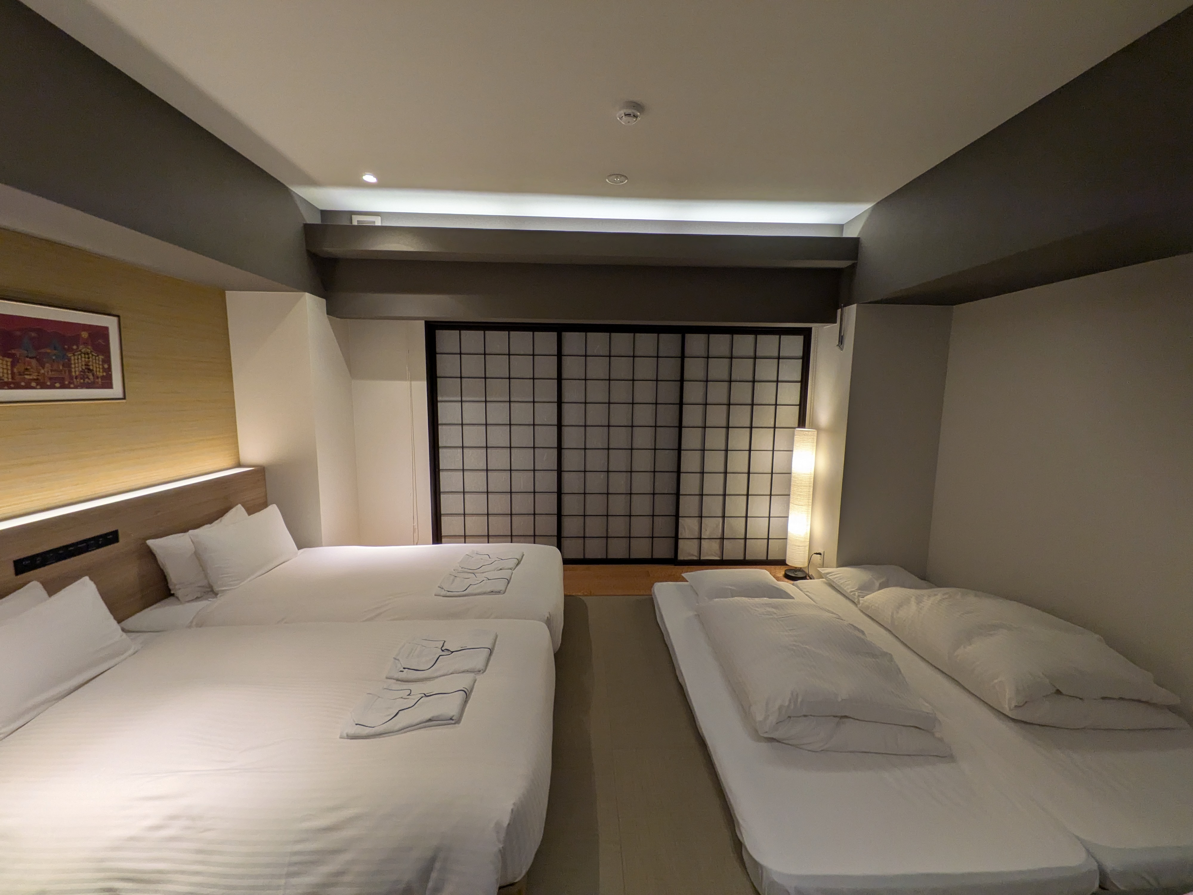 Koko Hotel Kyoto family room with twin beds and tatami futons